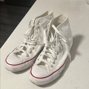 Classic White converse High-Tops. Size 8.5 women 6.5 men’s. Like new